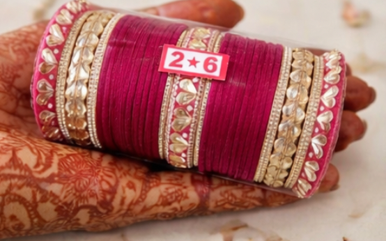 Crafted with premium, soft-touch magenta velvet bangles that offer a deep, royal luster.